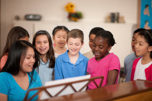 Children's choir singing together.