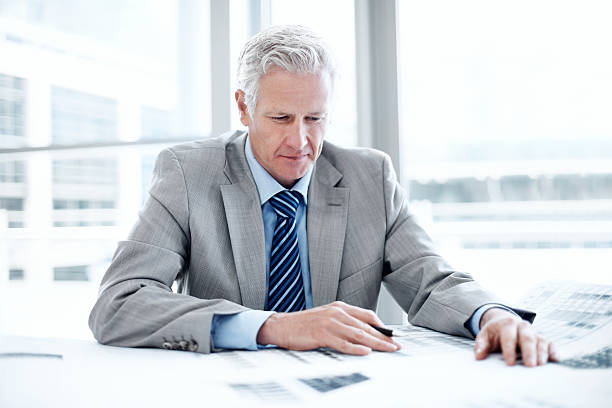 istock Perfecting his business plans 175411028