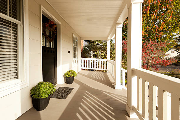 Covered Front Porch Covered front porch to beautiful home. porch stock pictures, royalty-free photos & images