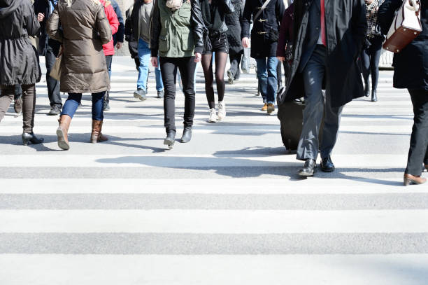 istock People crossing street, motion blur 175411825