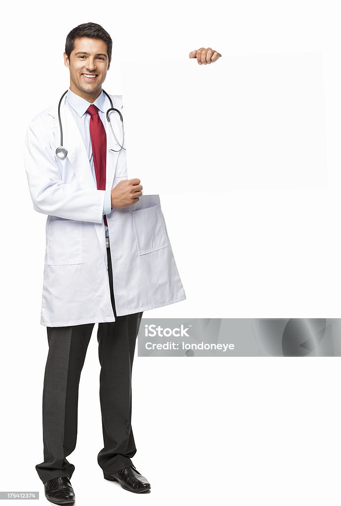 Молодой мужской врач держит пустой Знак-изолированные - Стоковые фото Врач роялти-фри