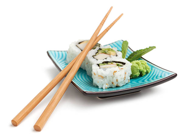 California roll sushi and chopsticks