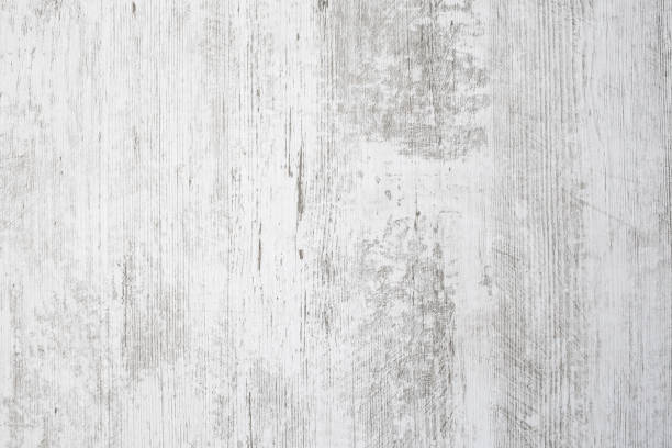 istock White table top with gray veins imprint, weathered wood backdrop, abstract texture 1754128528