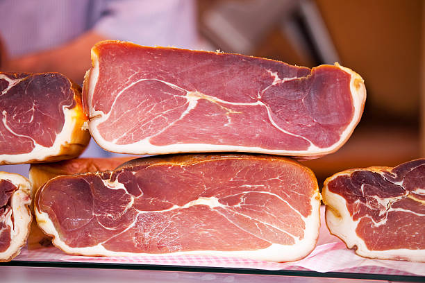 Bayonne Ham Bayonne Ham for sale at a food market in the Basque region of sout west of France. french basque country photos stock pictures, royalty-free photos & images