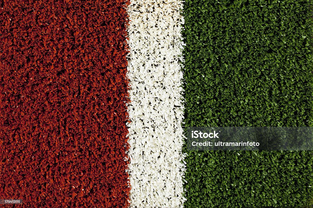 Synthetic Grass Background Synthetic grass. Soccer - Football field.  Close-up. The grain and texture added. Adobe RGB color profile. Agricultural Field Stock Photo