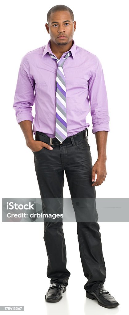 Standing Young Man In Loose Tie Portrait of a young man on a white background. http://s3.amazonaws.com/drbimages/m/jb.jpg 20-29 Years Stock Photo