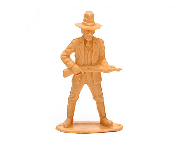 wild west mountain uomo con fucile - color image cowboy plastic people foto e immagini stock