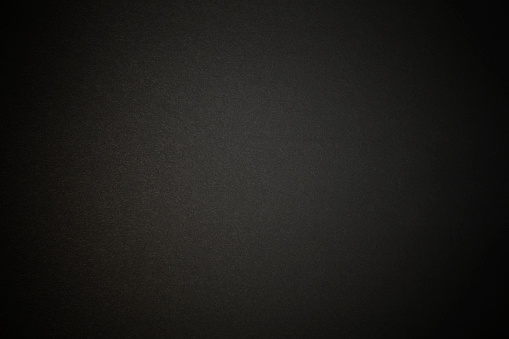 Fondo de textura de papel de color negro con spotlight photo