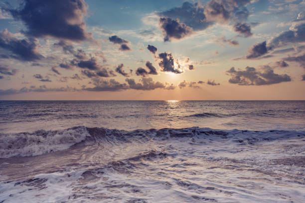 istock Amazing cloudscape above the sea at sunset time. 1754136242