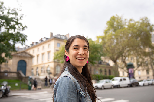 Portrait of half-Japanse woman on the streets of Paris
