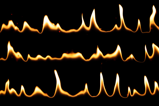 Set of thin flames isolated on black background