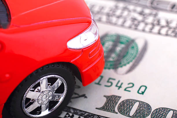 Model Red car on 100 dollar bill Car and money cash for cars stock pictures, royalty-free photos & images