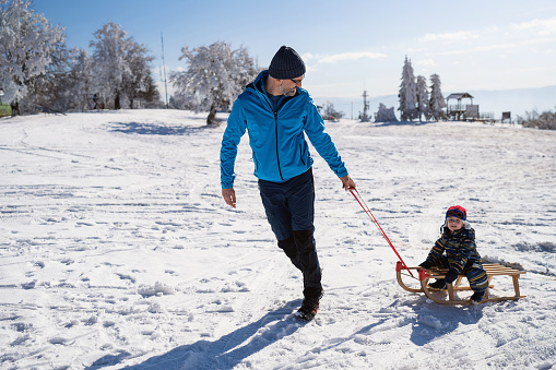 Father and son on winter vacation.