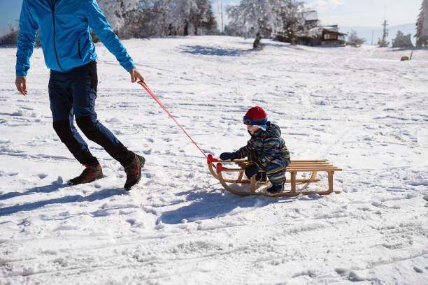 istock Father and son on winter vacation 1754144312