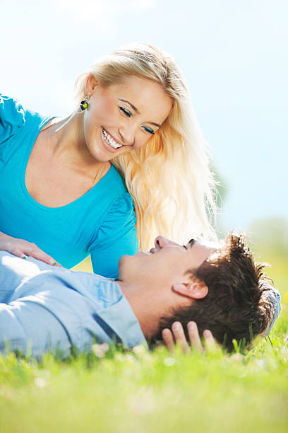 istock Young couple lying in park. 175414743
