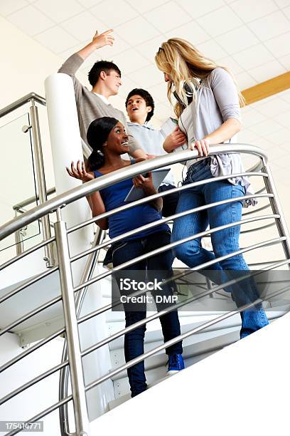 Student Walking Down Steps On Campus Stock Photo - Download Image Now - 20-29 Years, Adolescence, Adult