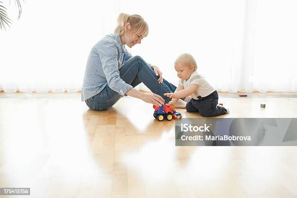 Playing With Toy Truck Stock Photo - Download Image Now - Baby - Human Age, Toy Truck, Mother