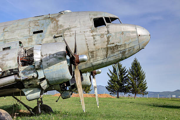Old abandoned Douglas DC-3 airplane Old abandoned Douglas DC-3 airplane, Otocac, Croatia airplane commercial airplane propeller airplane aerospace industry stock pictures, royalty-free photos & images