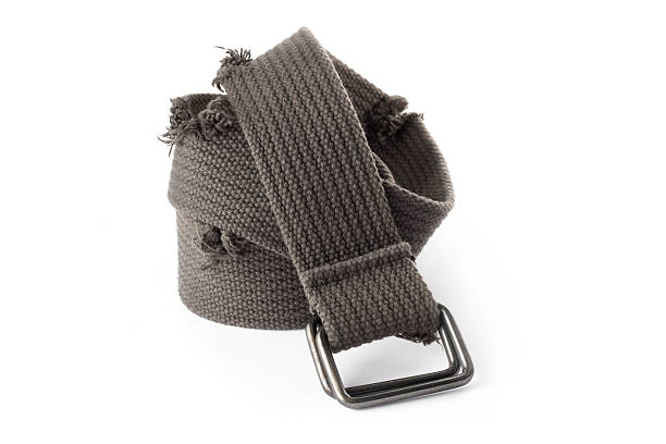 Old canvas belt isolated on a white background