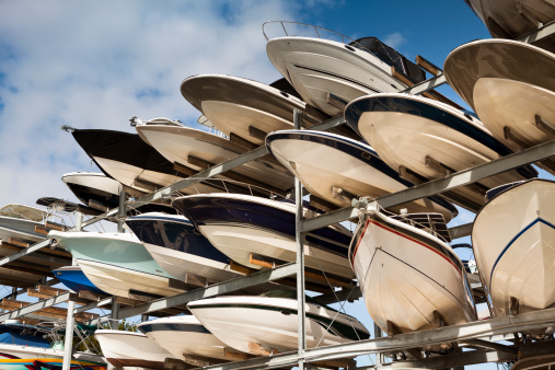 Ships piled in racks for winter season at a shipyard dock in Florida USA