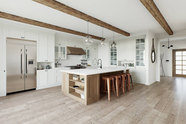 istock Traditional large L-shaped kitchen with large island and kitchen appliances. Emphasis on a large metal refrigerator in the interior. 3D rendering 1754160890