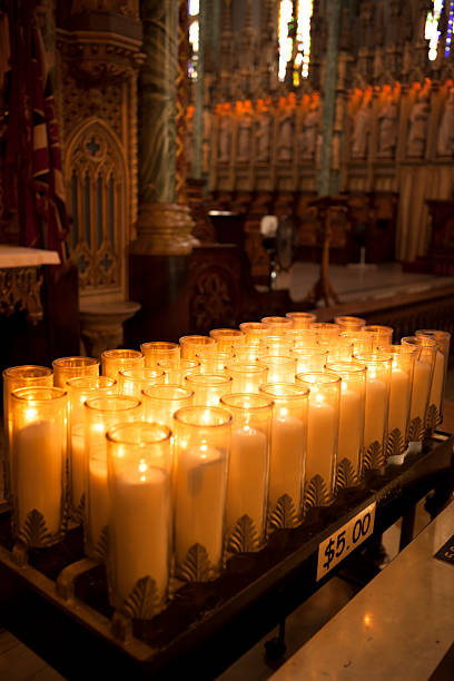 istock Candles lit at a church 175416098