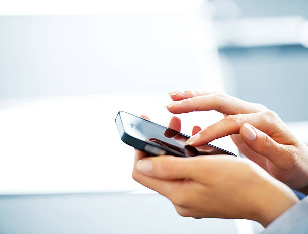 istock Businesswoman with smart phone 175416666