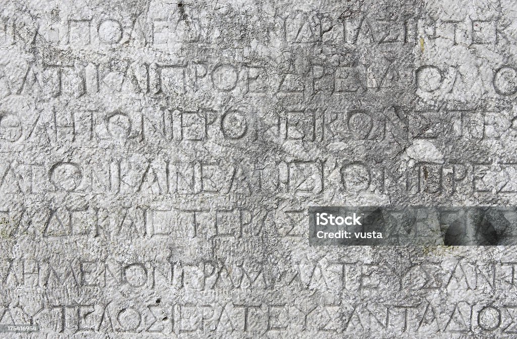 壁の質感にギリシャのアルファベット - アルファベットのロイヤリティフリーストックフォト