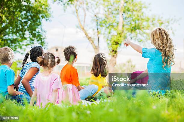 Learning In The Park Stock Photo - Download Image Now - Adult, African Ethnicity, African-American Ethnicity