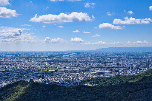 Cityscape of Gifu City, Gifu Prefecture, seen from Mt. Kinka Observation Deck on a sunny day