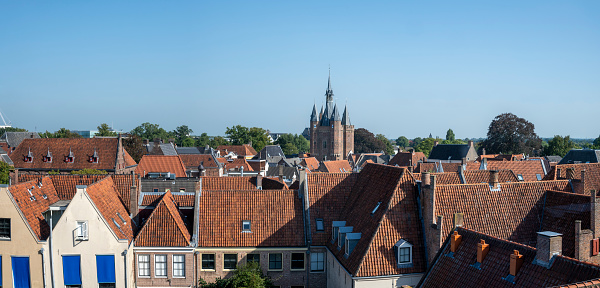 Zwolle downtown district high angle rooftop view during a late summer day. Seen from above we can see various historical buildings, such as the Sassenpoort gate.