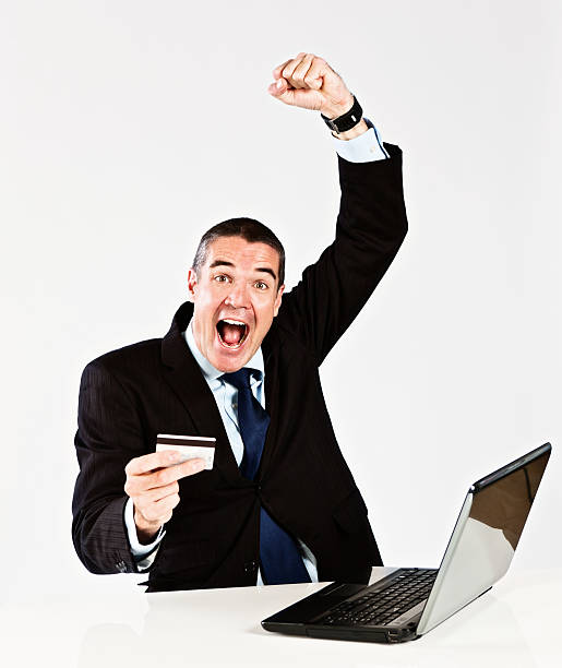 istock Overjoyed businessman with credit card and laptop: e-commerce rocks 175417752