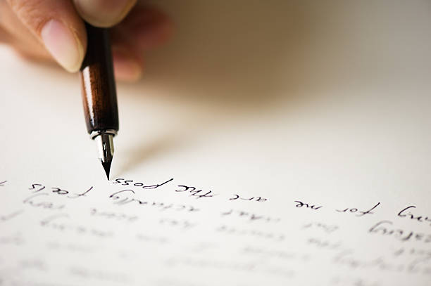 istock Close up of pen writing a letter 175417788