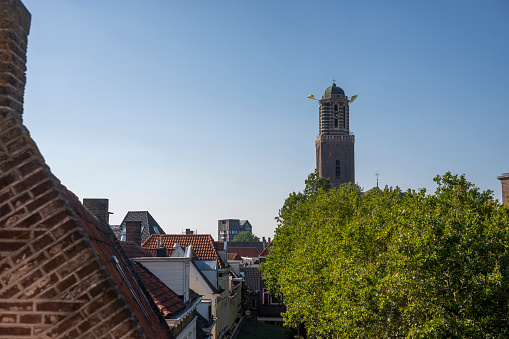 Zwolle downtown district high angle rooftop view during a late summer day. Seen from above we can see various historical buildings, such as the Peperbus church tower.