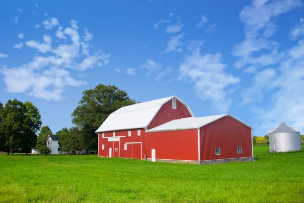 istock Red barn with silo in morning- Nothern Indiana 1754180131