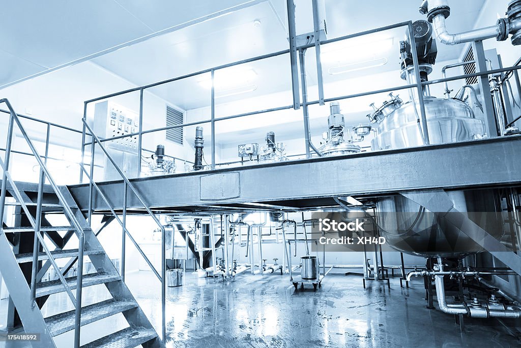 Clean Room "pharmaceutical factory equipment workingPharmaceutical Factory Laboratory equipment in clean room,real place" Medicine Stock Photo