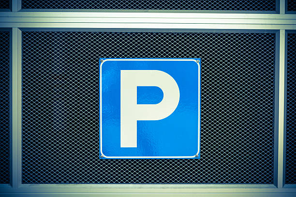 istock Parking sign over a modern garage fence 175418742