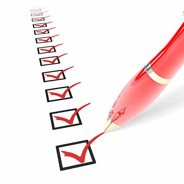 A red pen checking the last from a list of checkboxes
