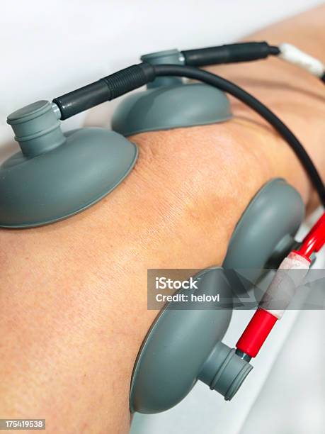 Physiotherapy Of Knee Stock Photo - Download Image Now - Cable, Chiropractic Adjustment, Color Image