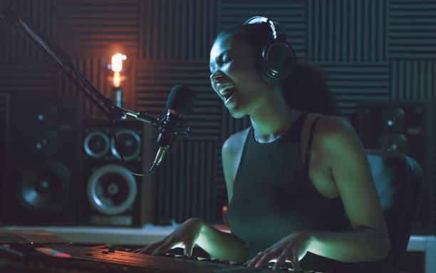 istock Artist recording a song in the studio 1754197525