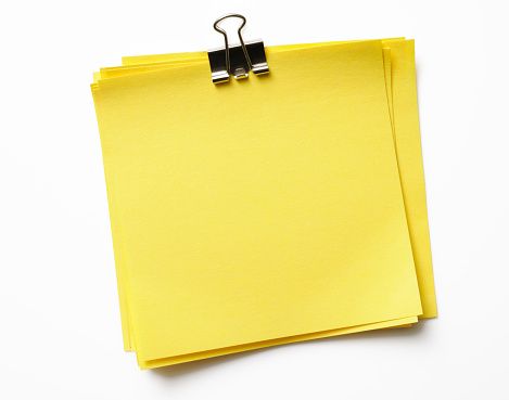 With CLIPPING PATH.Stacked blank yellow sticky note isolated on white background with clipping path.Studio shot.
