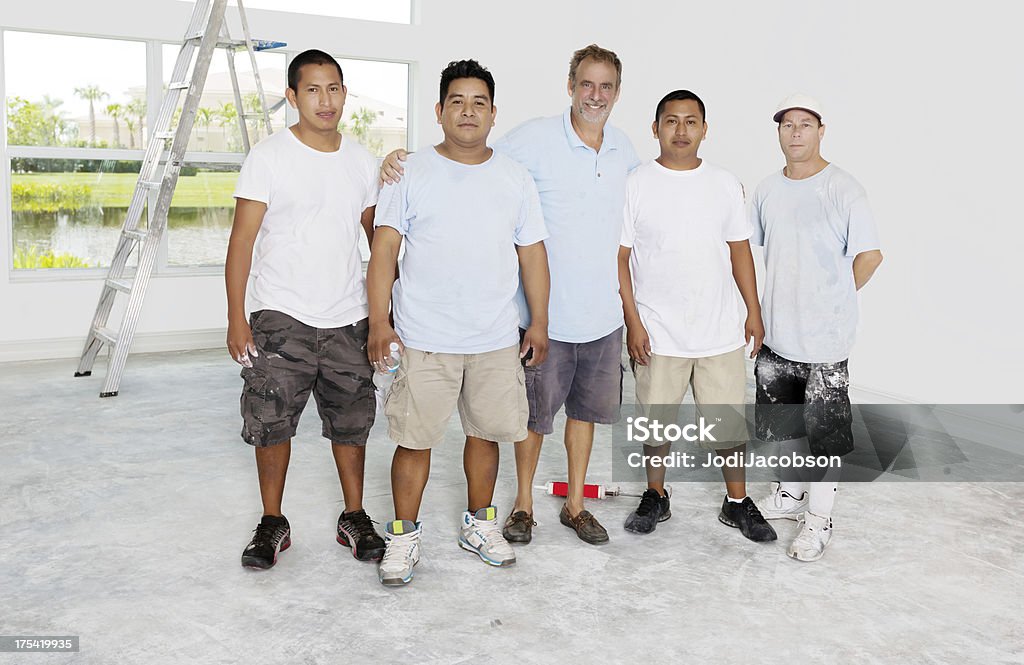 Construction: Group of happy contractors A group of happy male contractors after a days workClick here to view my other People and Related images Adult Stock Photo