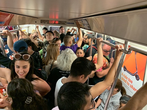 Jersey City, NJ, USA June 30 commuters are crammed into a PATH subway train car in Jersey City New Jersey as it travels under the Hudson River to New York City
