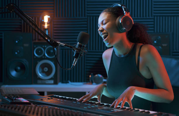 istock Artist recording a song in the studio 1754202359
