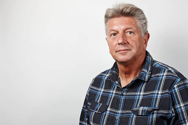 istock Mature man serious look head and shoulders portrait 175420401