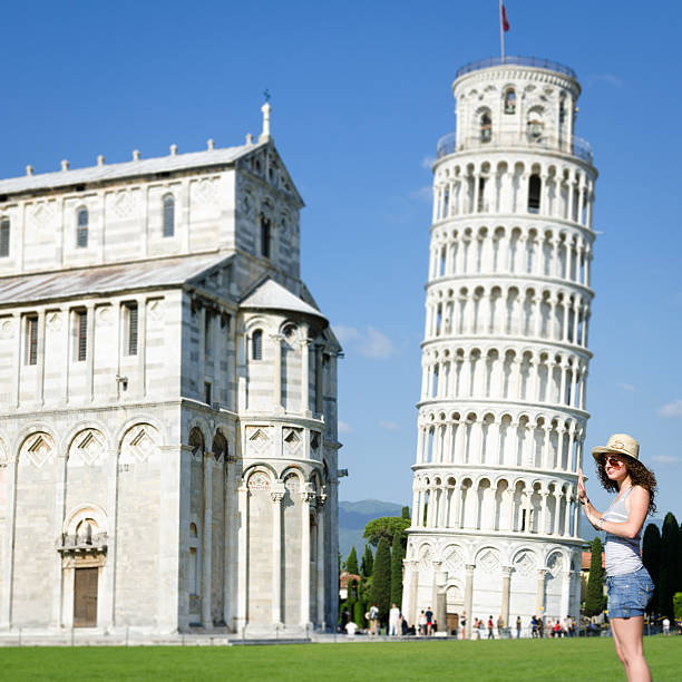 istock Tourist holding the Leaning tower on Pisa 175421035