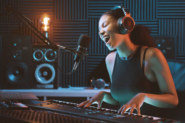 istock Artist recording a song in the studio 1754211245