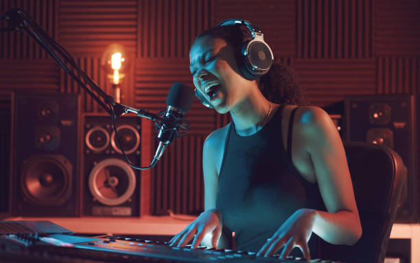 istock Artist recording a song in the studio 1754211839