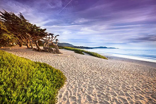Sand beach by the Pacific Ocean coastline in Carmel California near Monterey