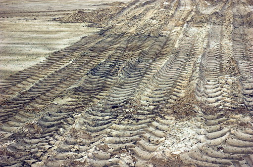 Tracks in sand.